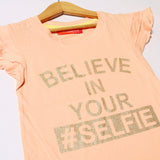 PEACH BELIEVE IN YOUR SELFIE PRINTED T-SHIRT FOR GIRLS